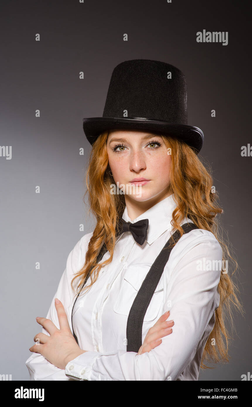 Pretty girl wearing retro hat isolated on gray Stock Photo - Alamy