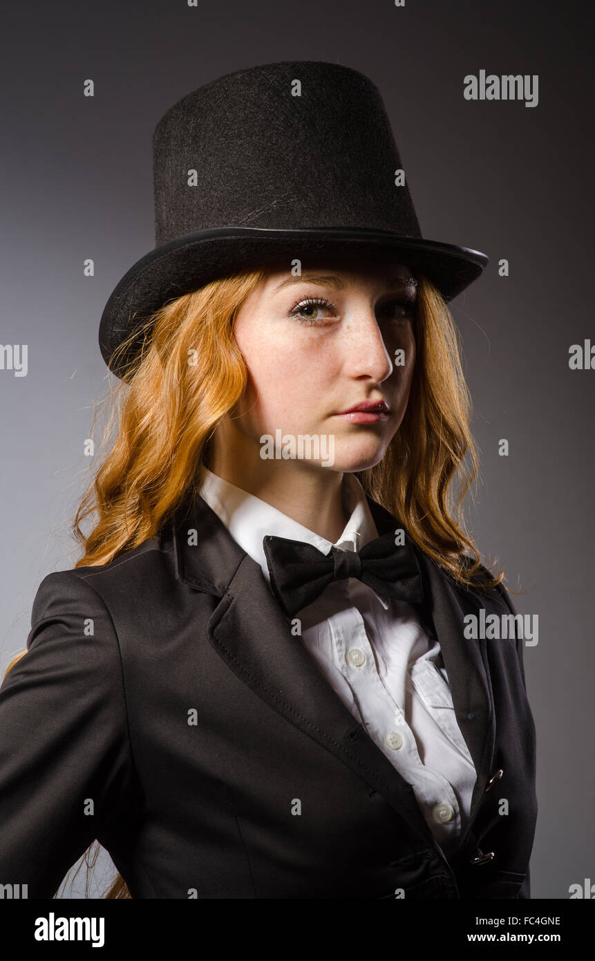 Pretty girl wearing retro hat isolated on gray Stock Photo - Alamy