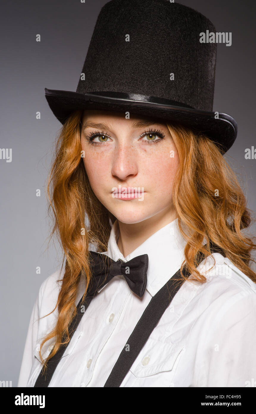 Pretty girl wearing retro hat isolated on gray Stock Photo - Alamy