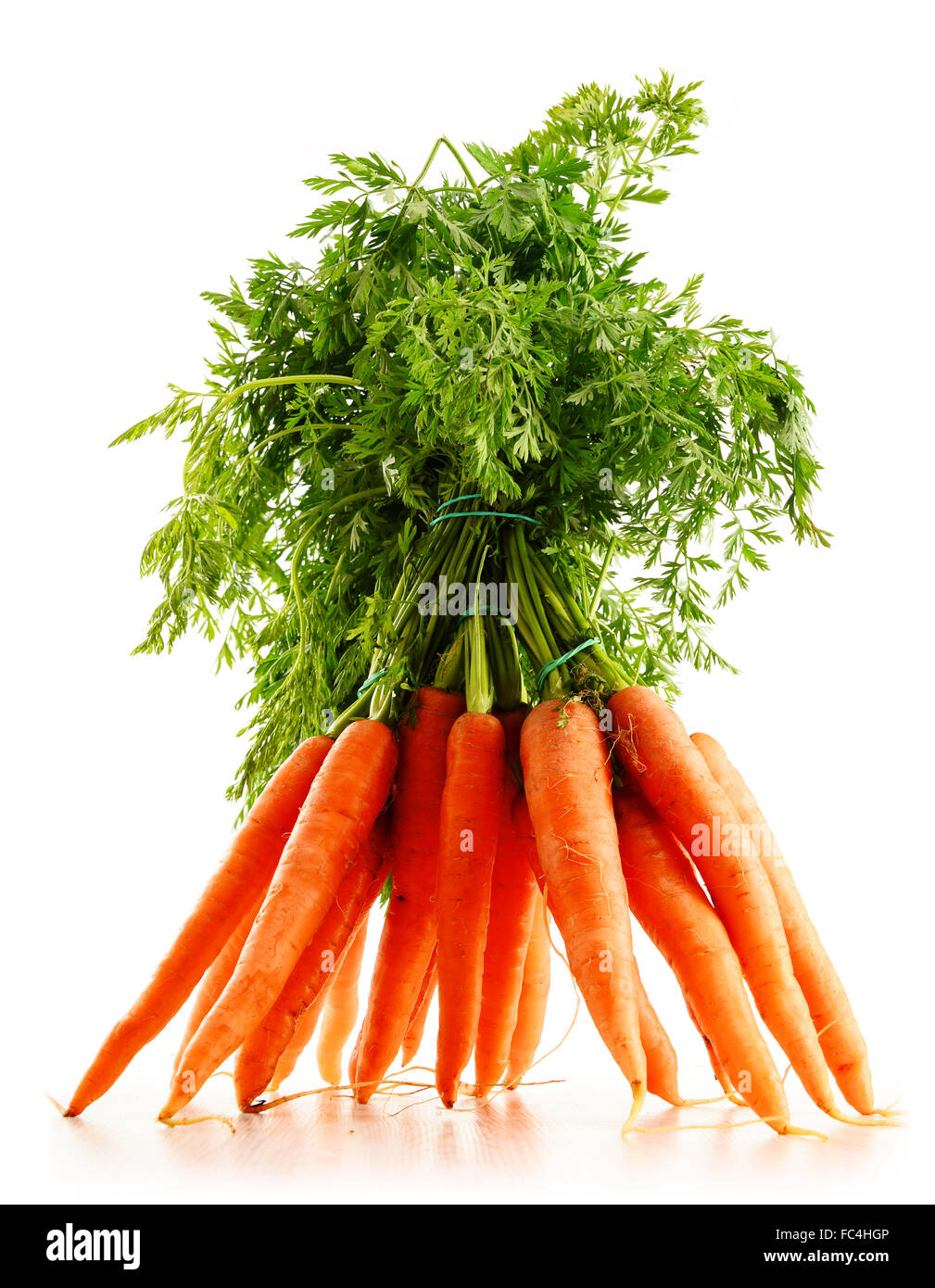 Fresh carrots bunch isolated on white background Stock Photo