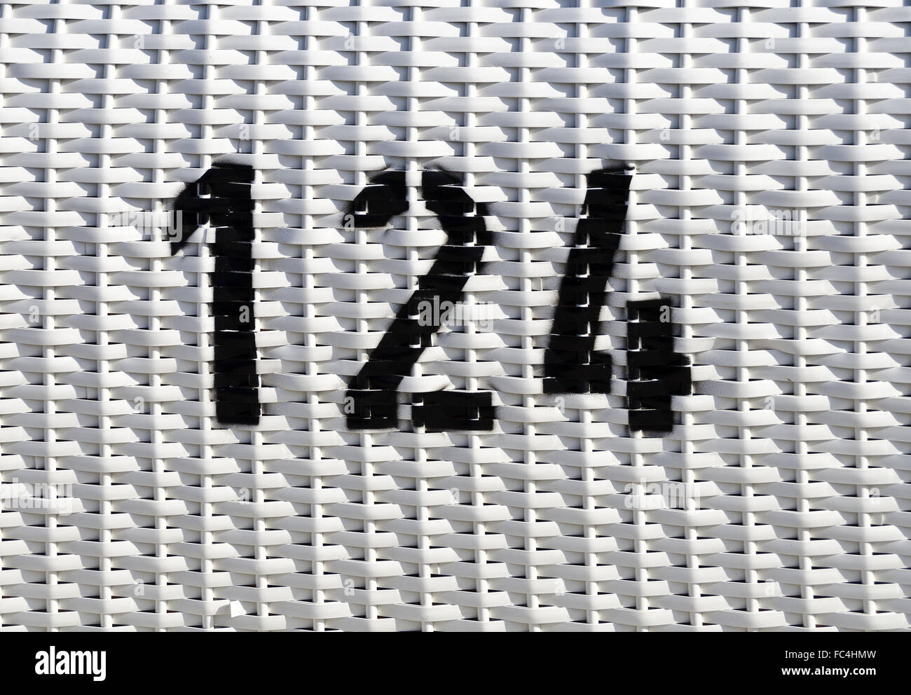 white plastic mesh with black number 124 Stock Photo