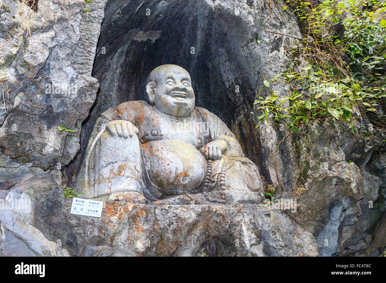 Buddha statues carved into hillside at Lingyin (Souls Retreat) Temple in Hangzhou, China. Stock Photo