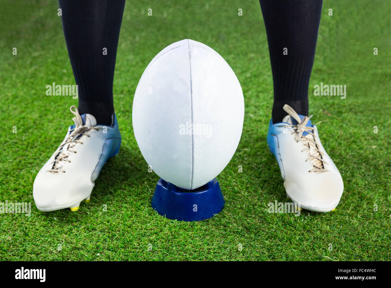 Rugby player ready to make a drop kick Stock Photo Alamy