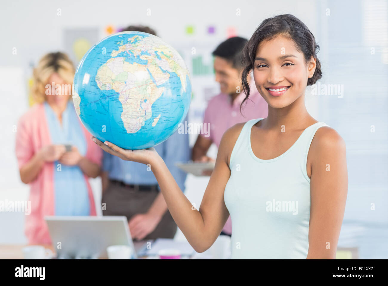 Man woman globe holding hi-res stock photography and images - Alamy