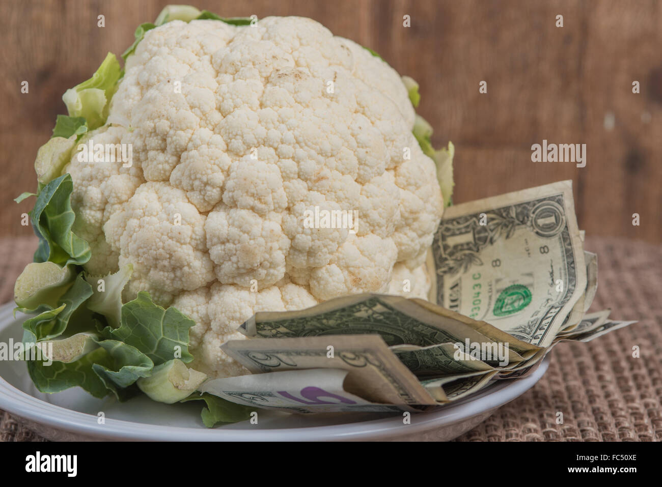 Head of cauliflower on a plate Stock Photo
