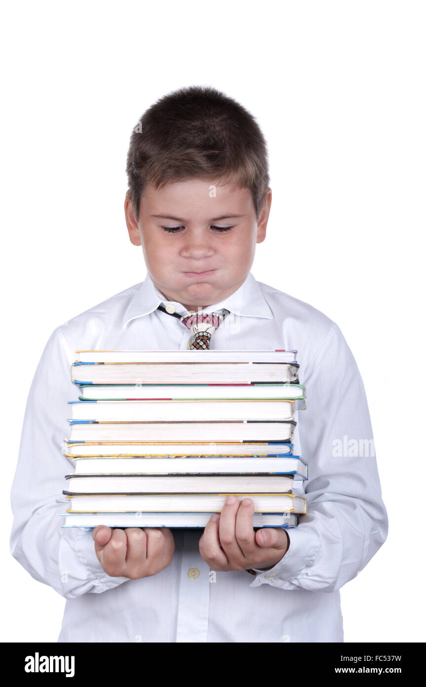 Boy holds heavy books Stock Photo Alamy