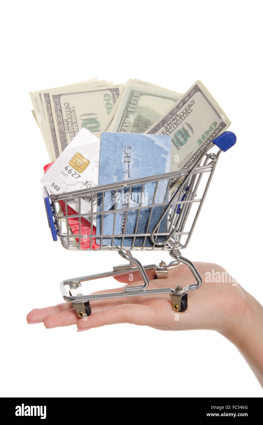 dollars and bank cards in shopping trolley Stock Photo