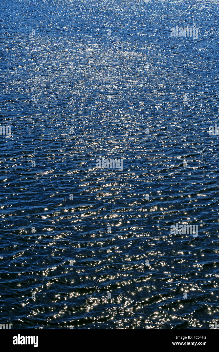 Blue Waves with Glitter Reflection Stock Photo