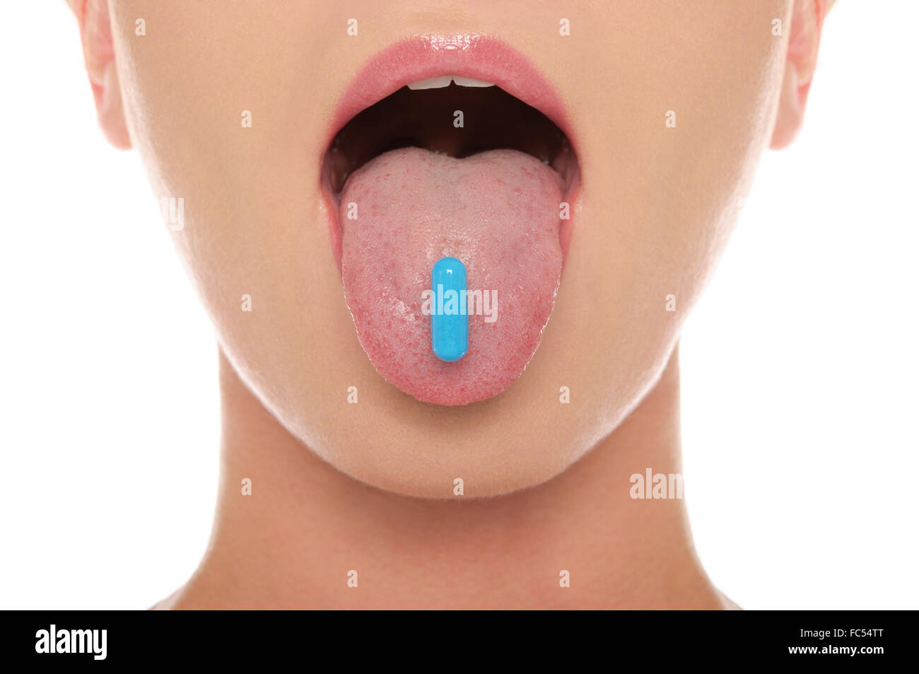 Pill on his tongue hanging out woman Stock Photo