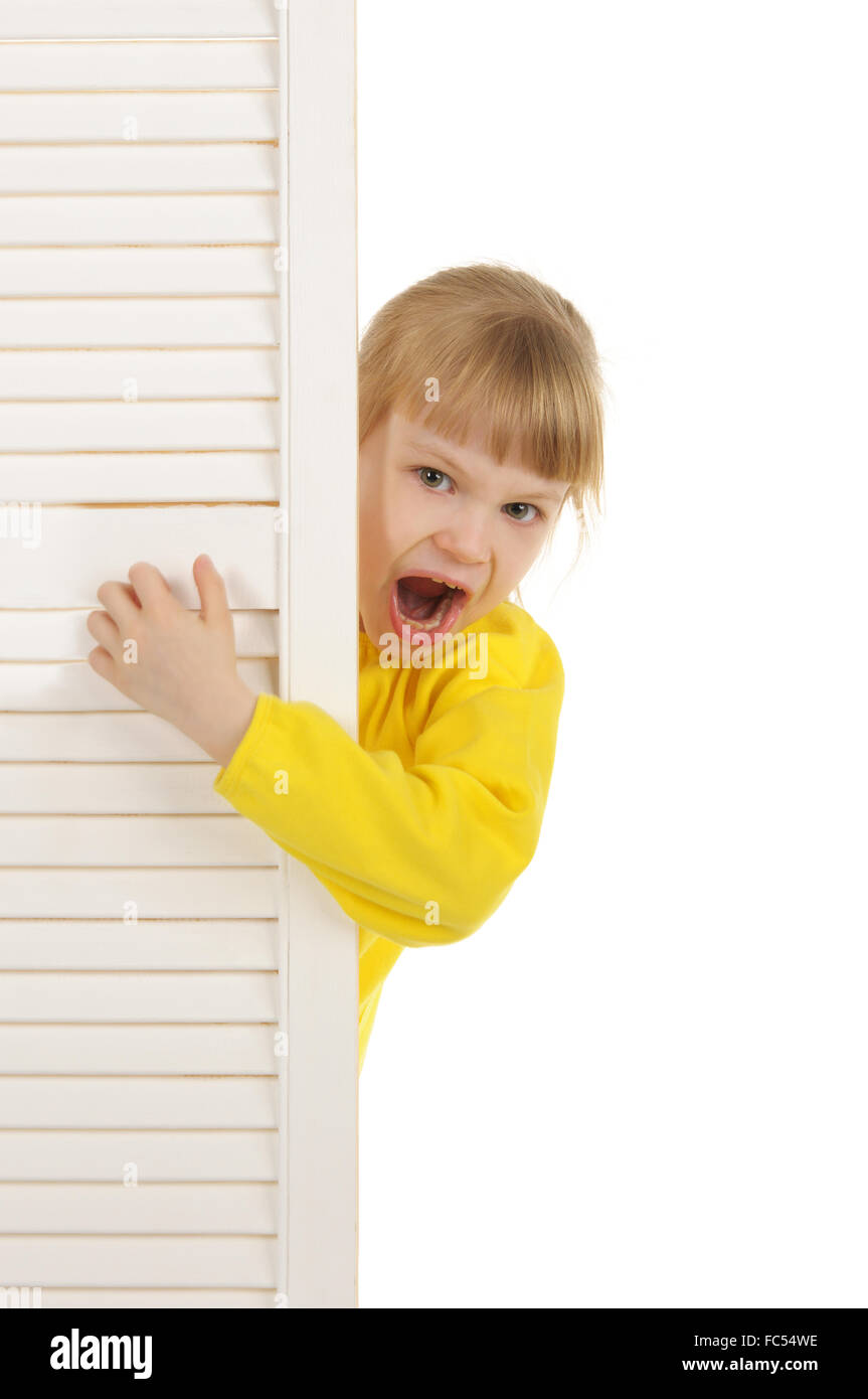 Malicious girl in yellow jacket Stock Photo Alamy