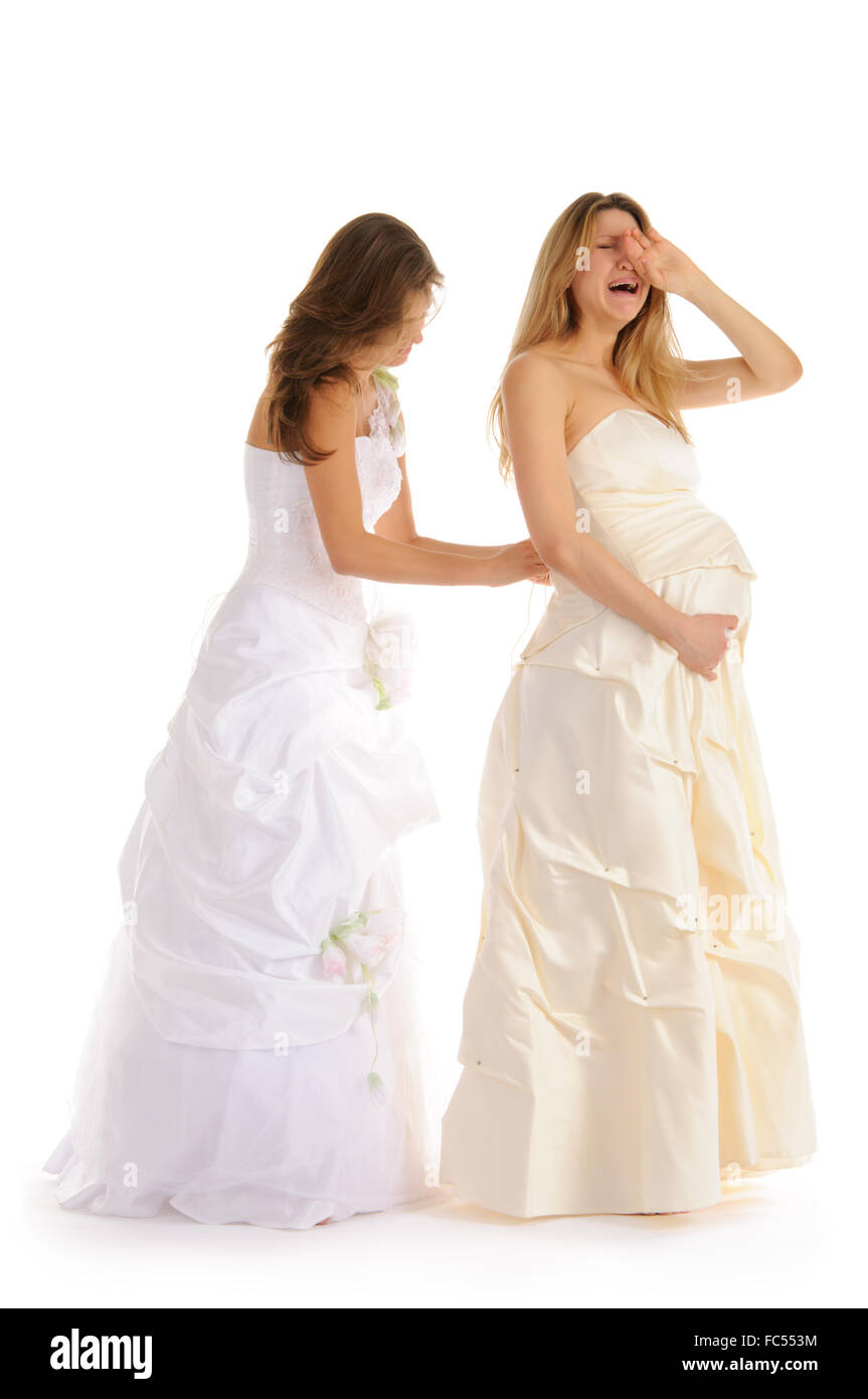 crying pregnant bride  with girlfriend Stock Photo