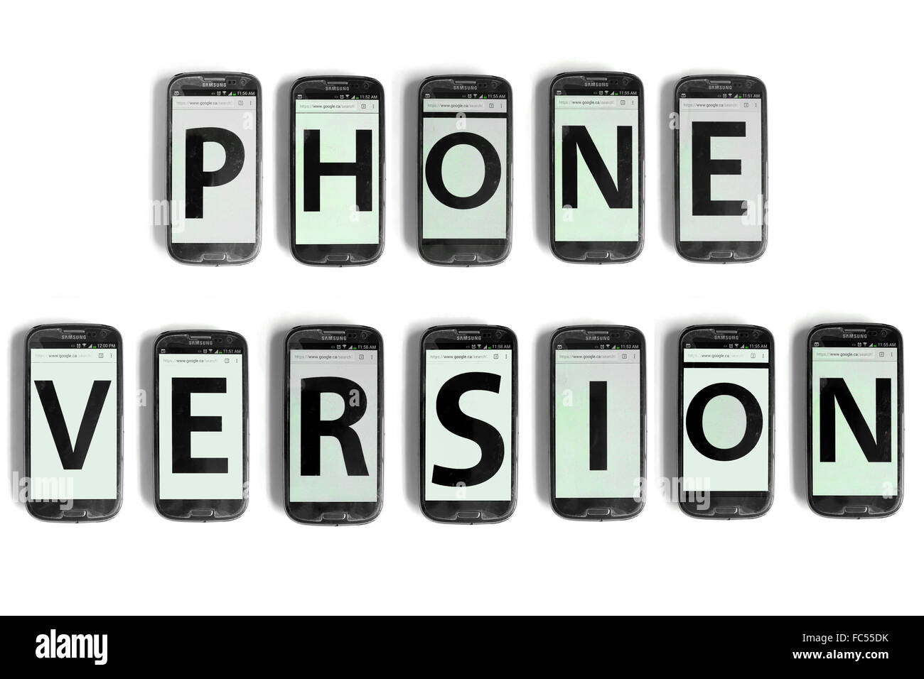 Phone Version written on the screens of smartphones photographed against a white background. Stock Photo