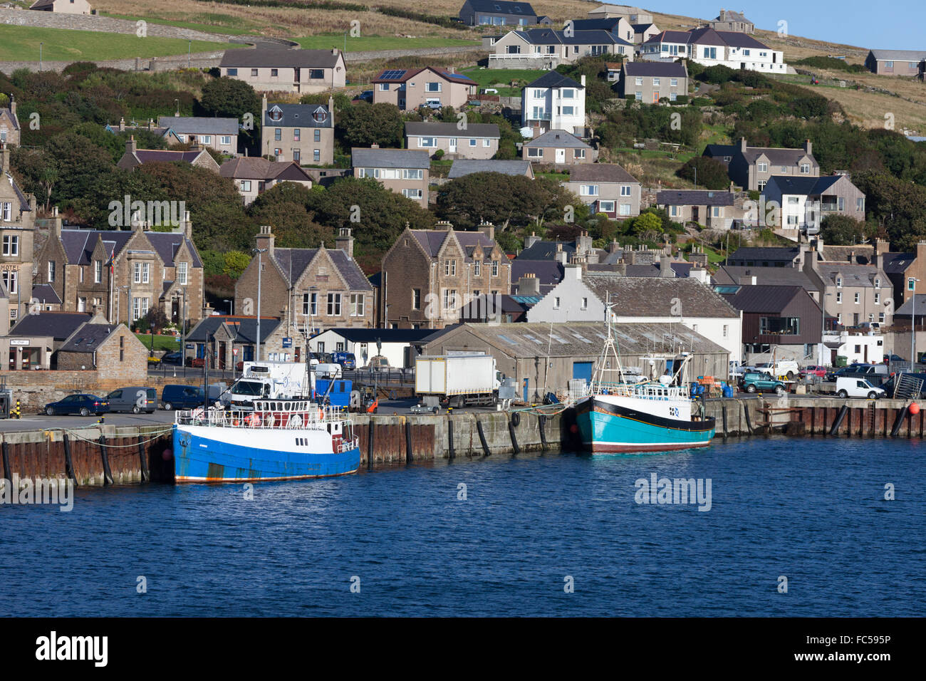 Boats in Stromness harbour, Orkney, Scotland Stock Photo