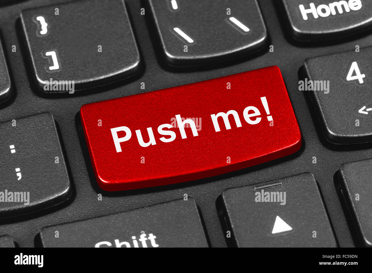 Computer notebook keyboard with Push me key Stock Photo