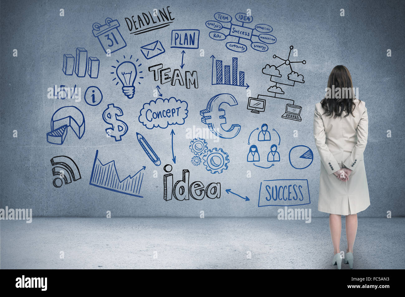 Composite image of rear view of businesswoman Stock Photo - Alamy