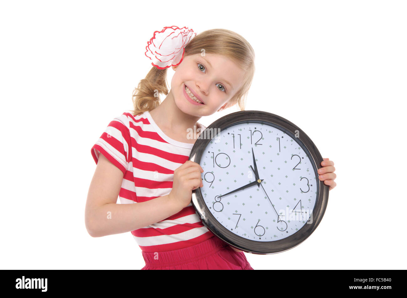 smiling girl with clock Stock Photo