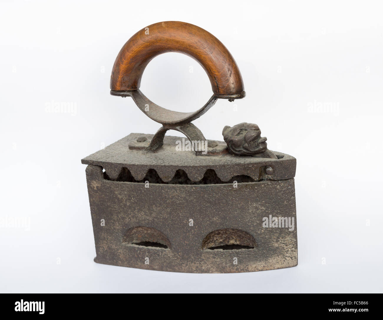 Old fashioned flatiron isolated on white background Stock Photo Alamy