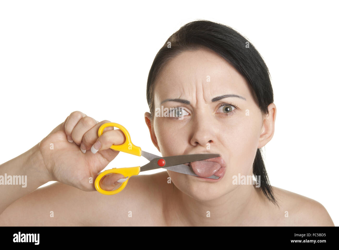 Young woman cuts off to itself tongue Stock Photo
