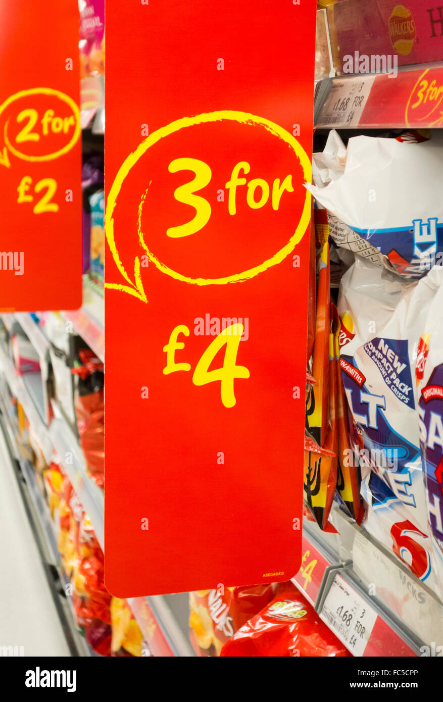 3 for £4 offer on large bags of crisps in Asda supermarket. UK Stock Photo