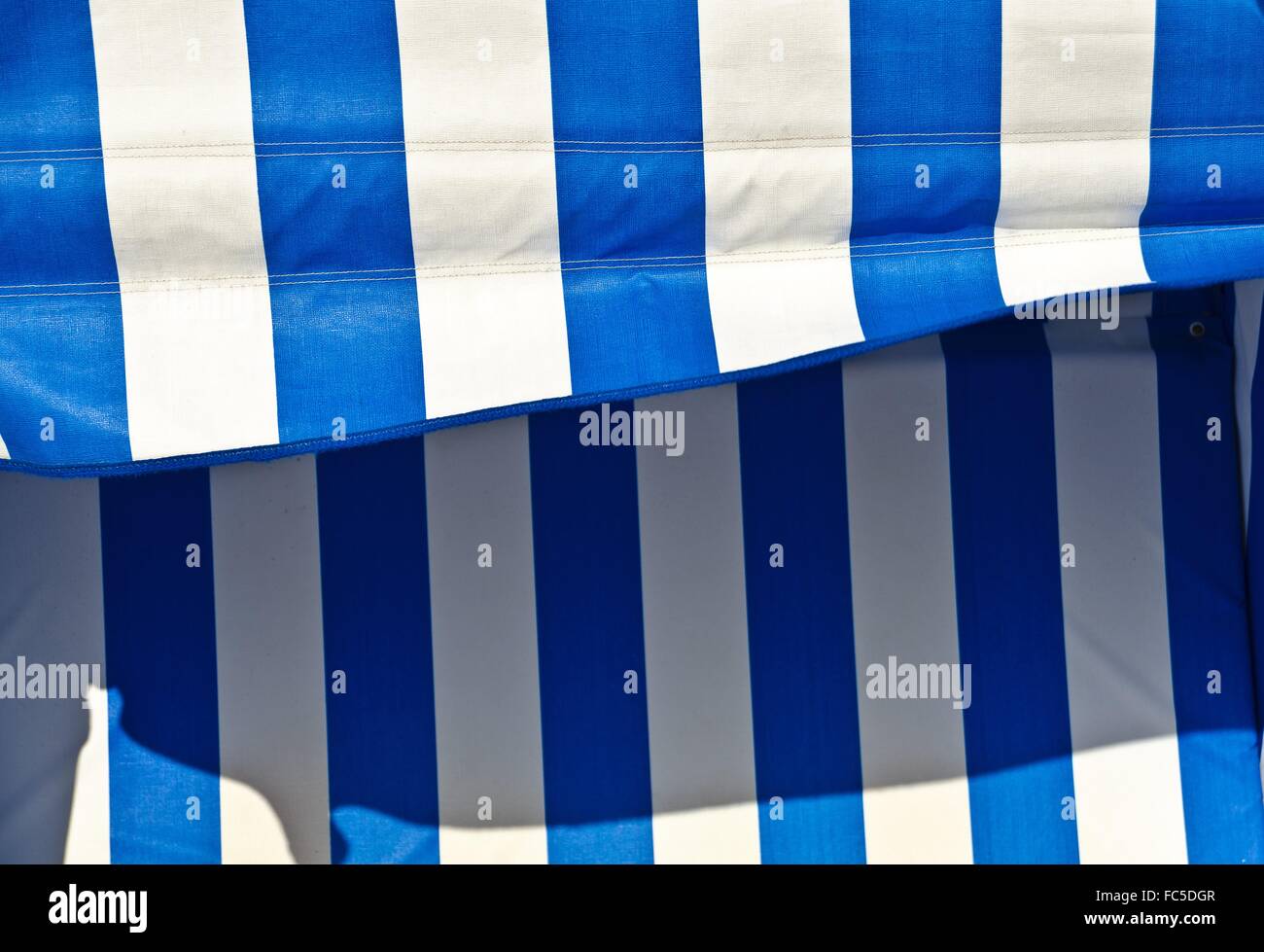 stripped fabric of a beach chair Stock Photo