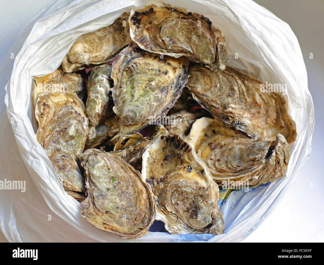 Bag of oysters hi-res stock photography and images - Alamy