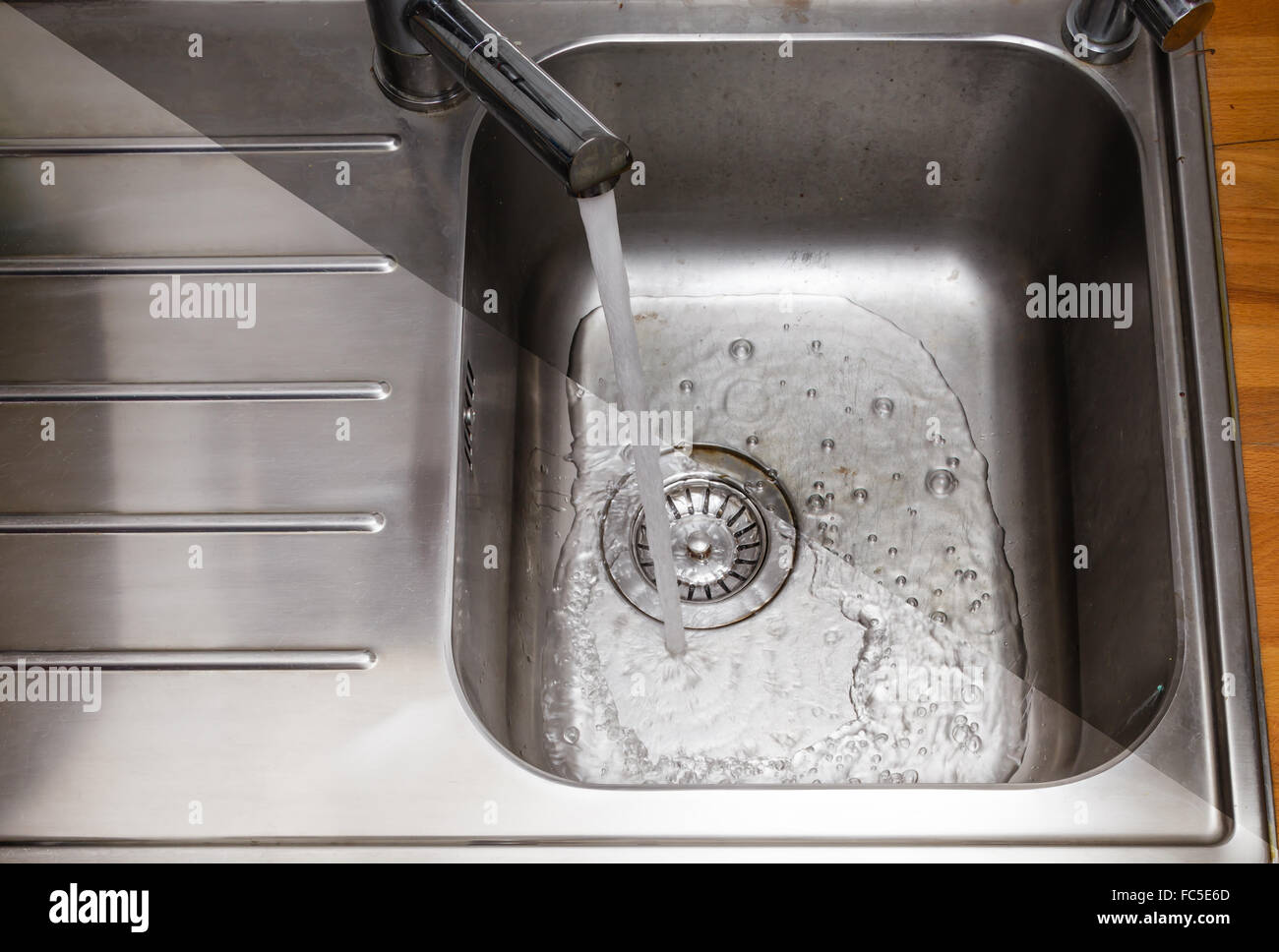 Daily cleaning of the kitchen washing sinks Stock Photo Alamy