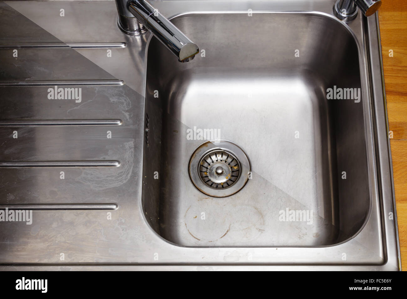 Daily cleaning of the kitchen washing sinks Stock Photo Alamy