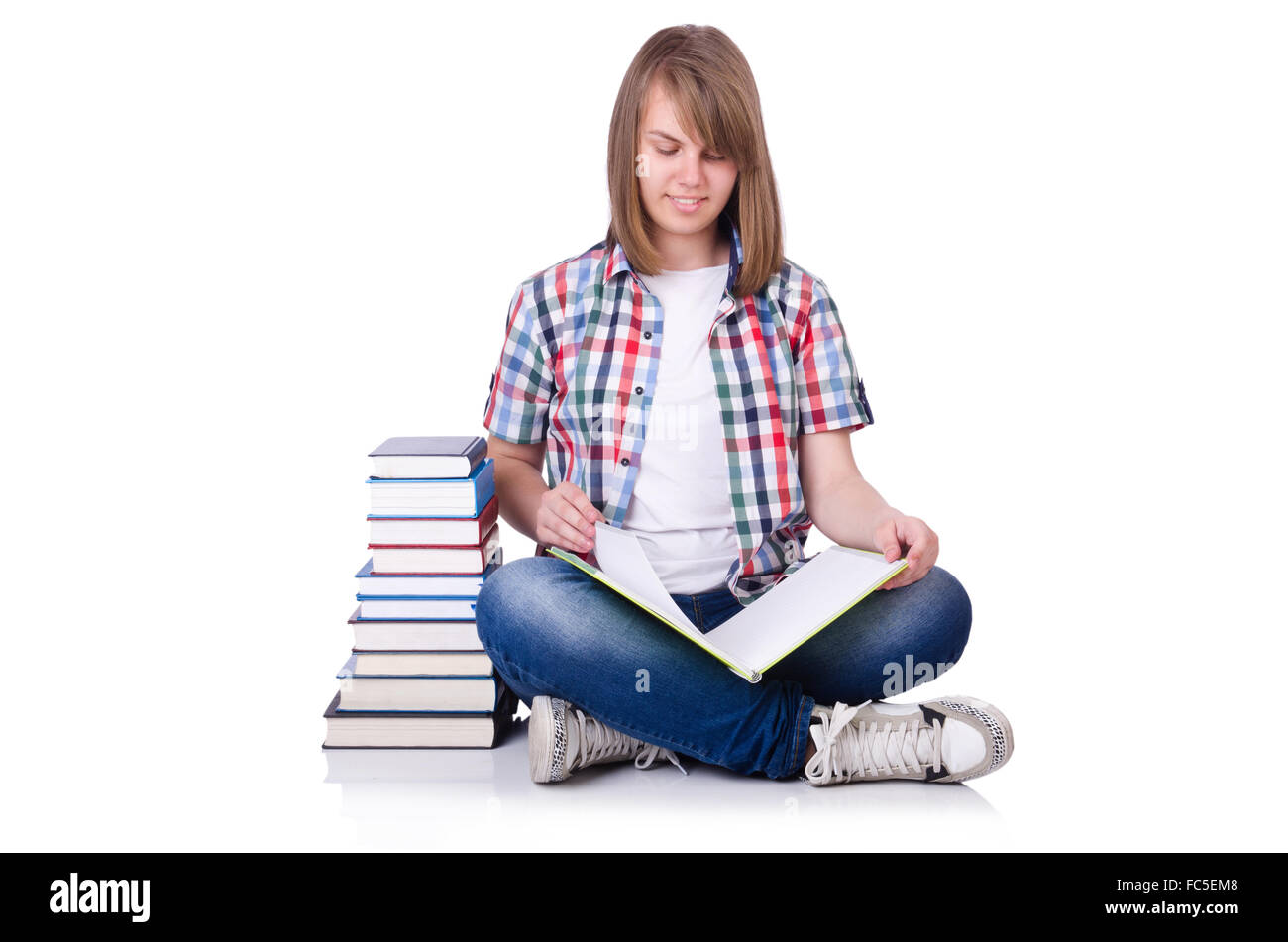 Smiling student with books isolated on white Stock Photo - Alamy