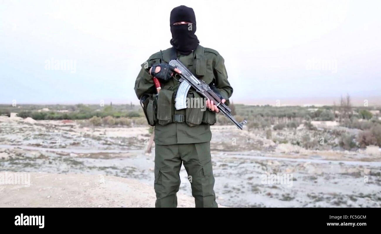 Islamic State of Iraq and the Levant propaganda video screenshot of a Hebrew speaking militant threatening attacks on Israel. Stock Photo