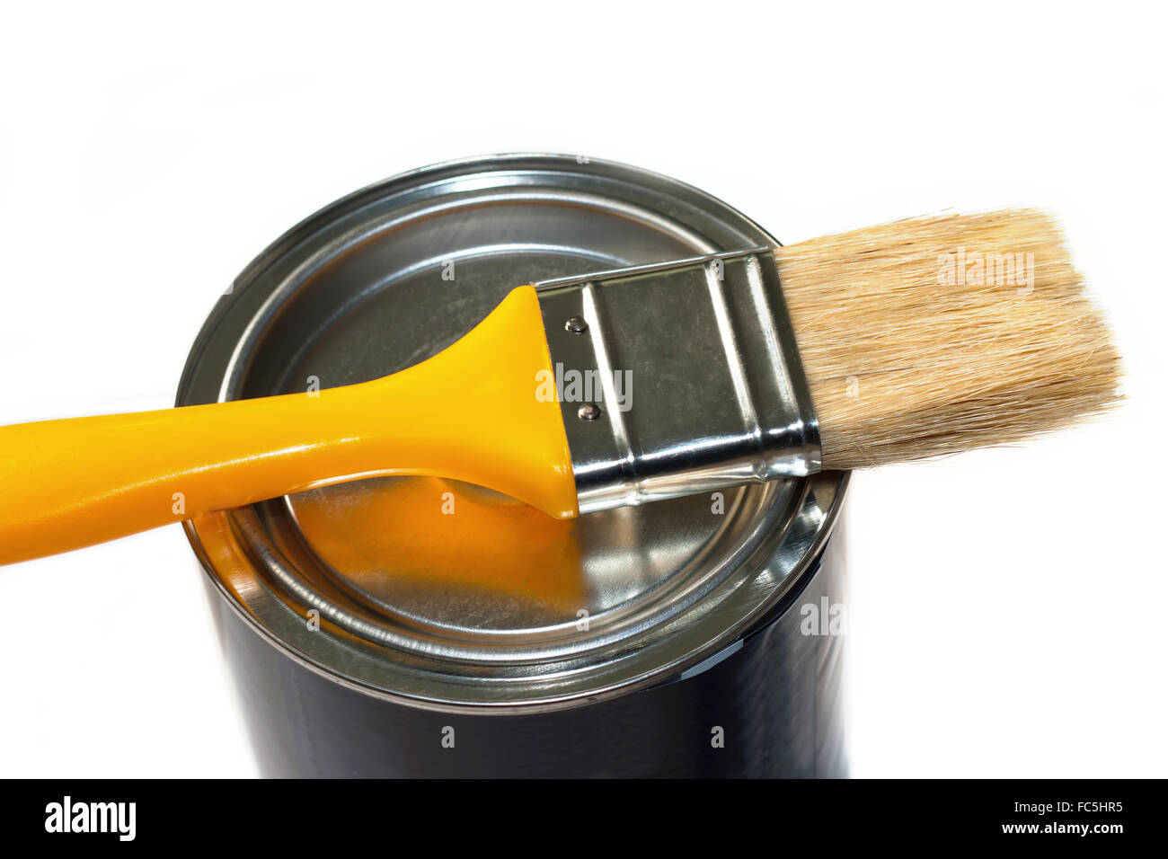 Brush and closed paint pot Stock Photo Alamy
