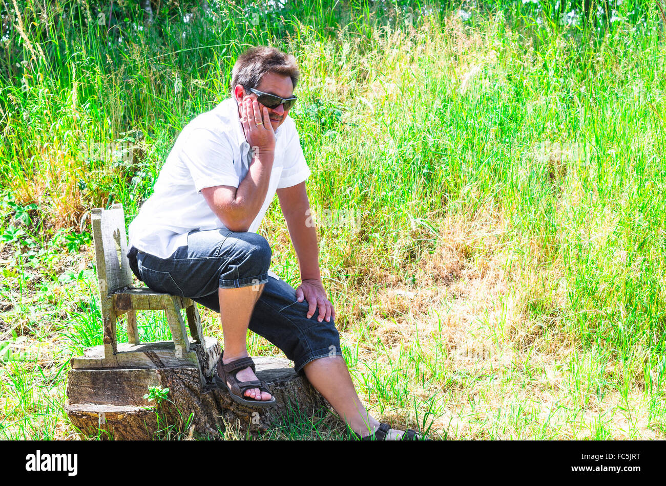 Man in thoughtful pose Stock Photo