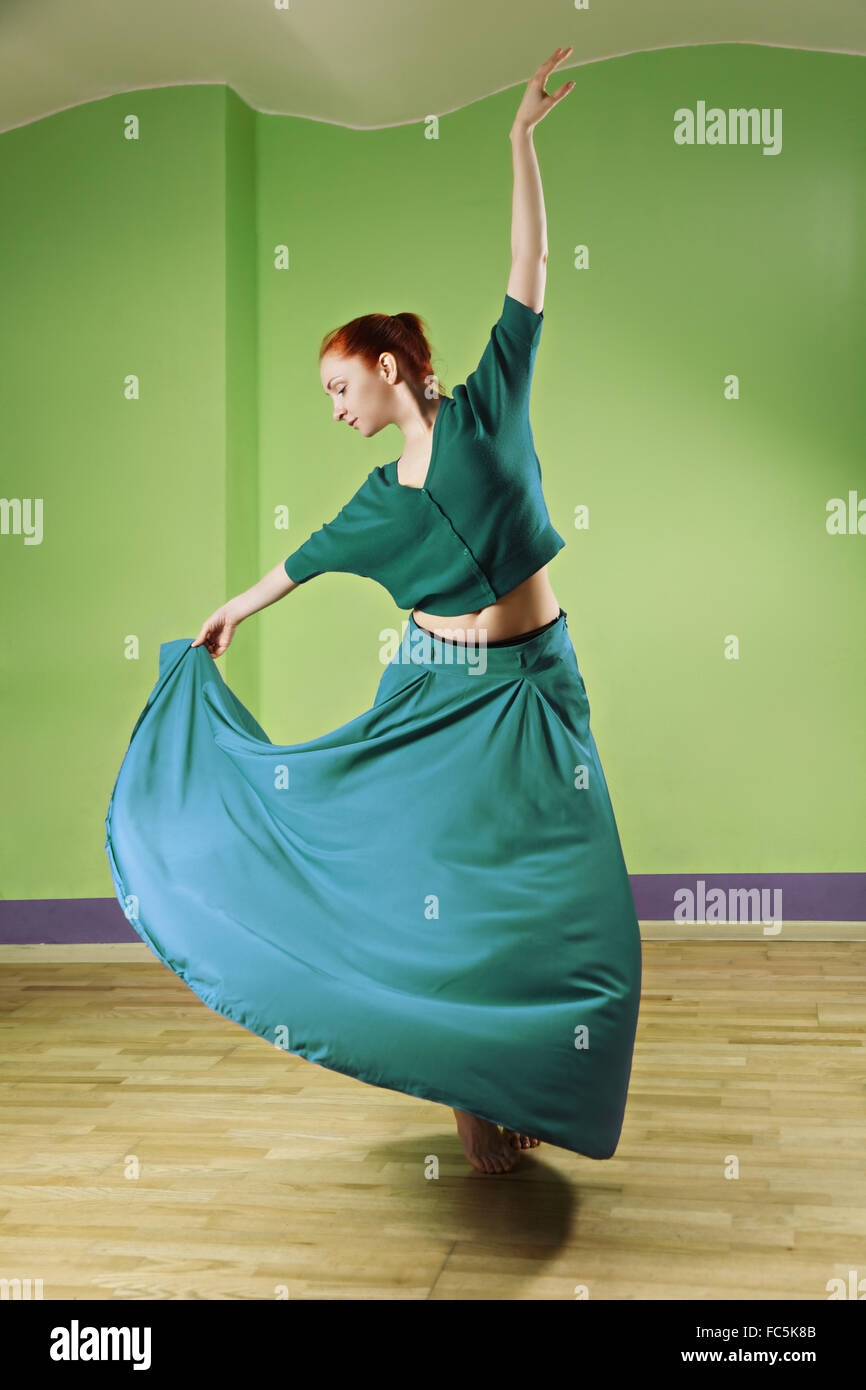 Dancing in a green room Stock Photo