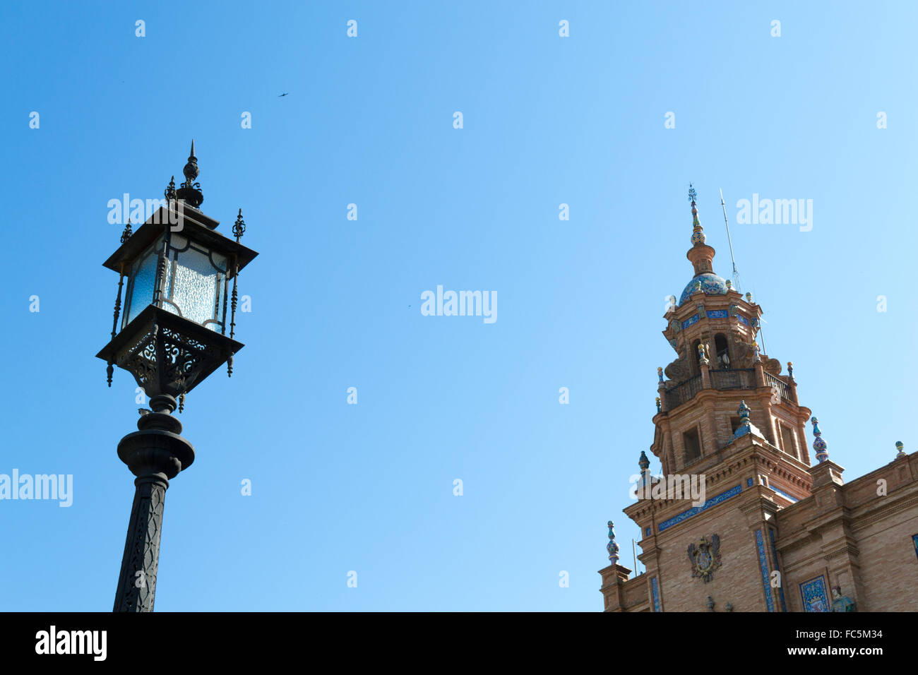 Lampost and tower at Spain square Stock Photo