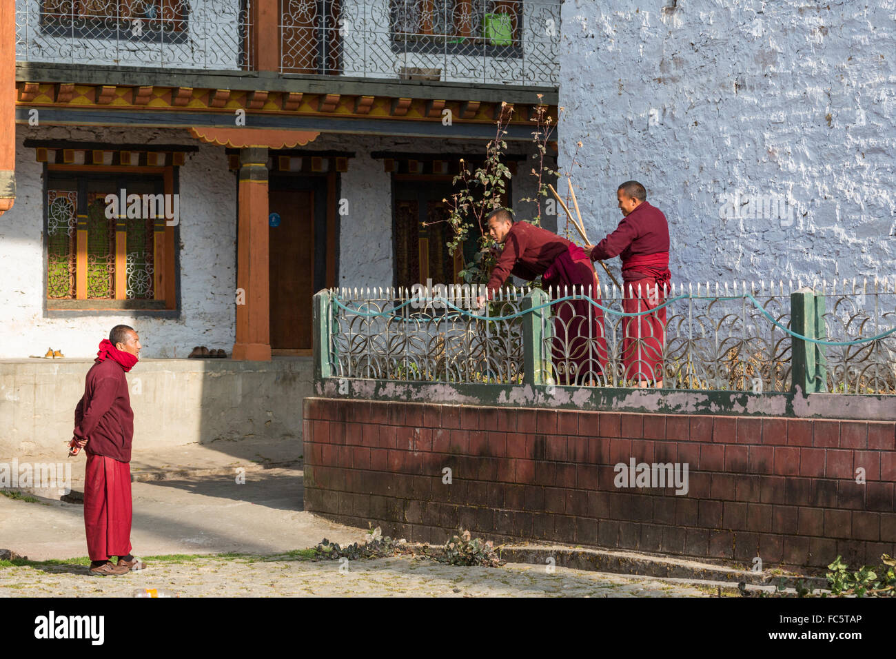 Monks Gardening, Jakar, Bumthang, Central Bhutan, Asia Stock Photo