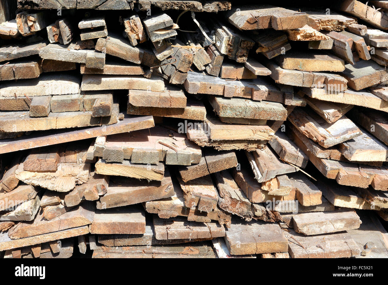 Stack firewood from a house demolition Stock Photo