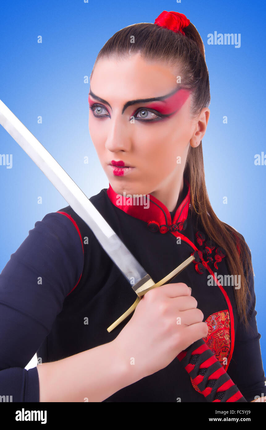 Woman in japanese martial art concept Stock Photo Alamy
