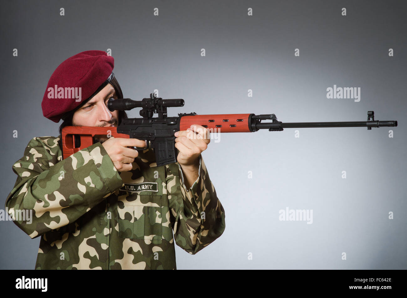 Military soldier aiming rifle against hi-res stock photography and ...