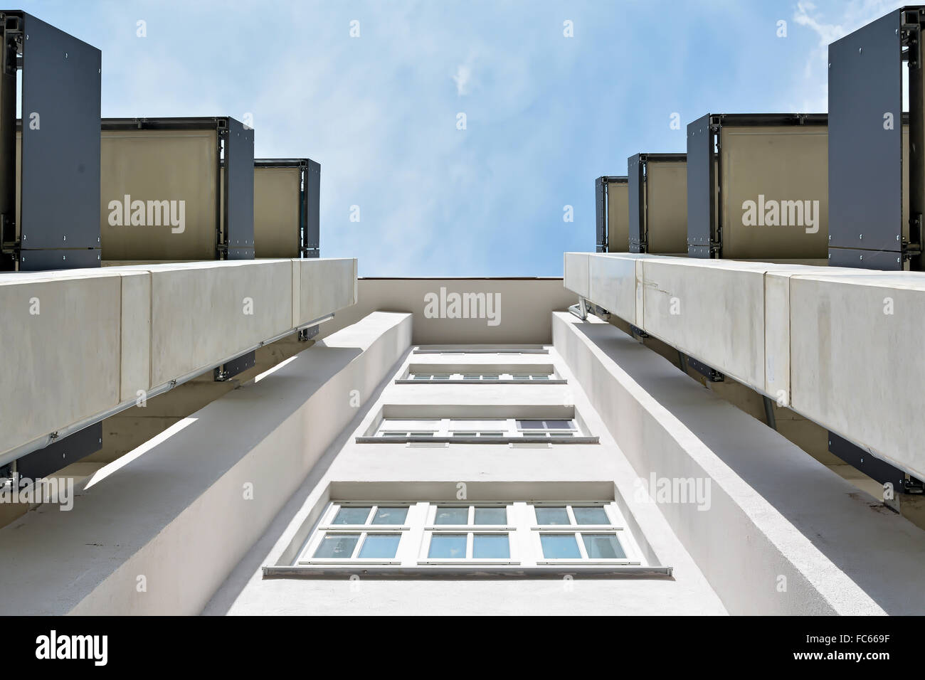 Image showcasing to apartments converted factory building Stock Photo - Alamy
