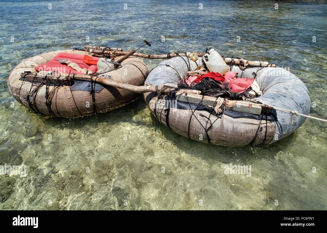 Refugees from Cuba abandoned this makeshift raft after making a 90-mile ocean journey to reach the United States shore at Islamorada in the Florida Keys and automatically qualify to become U.S. residents. Under U.S. law, any Cuban refugee caught at sea is sent back home, while those who make it ashore are granted permanent legal status after one year and the right to apply for citizenship after five years. An increase in Cuban refugees has occurred ever since the U.S. resumed diplomatic ties with Cuba in 2015. Stock Photo