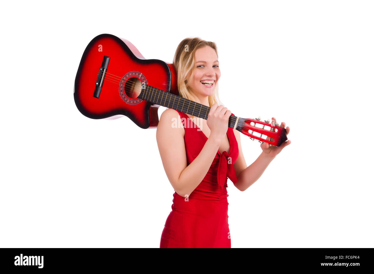 Pretty girl holding guitar isolated on white Stock Photo - Alamy