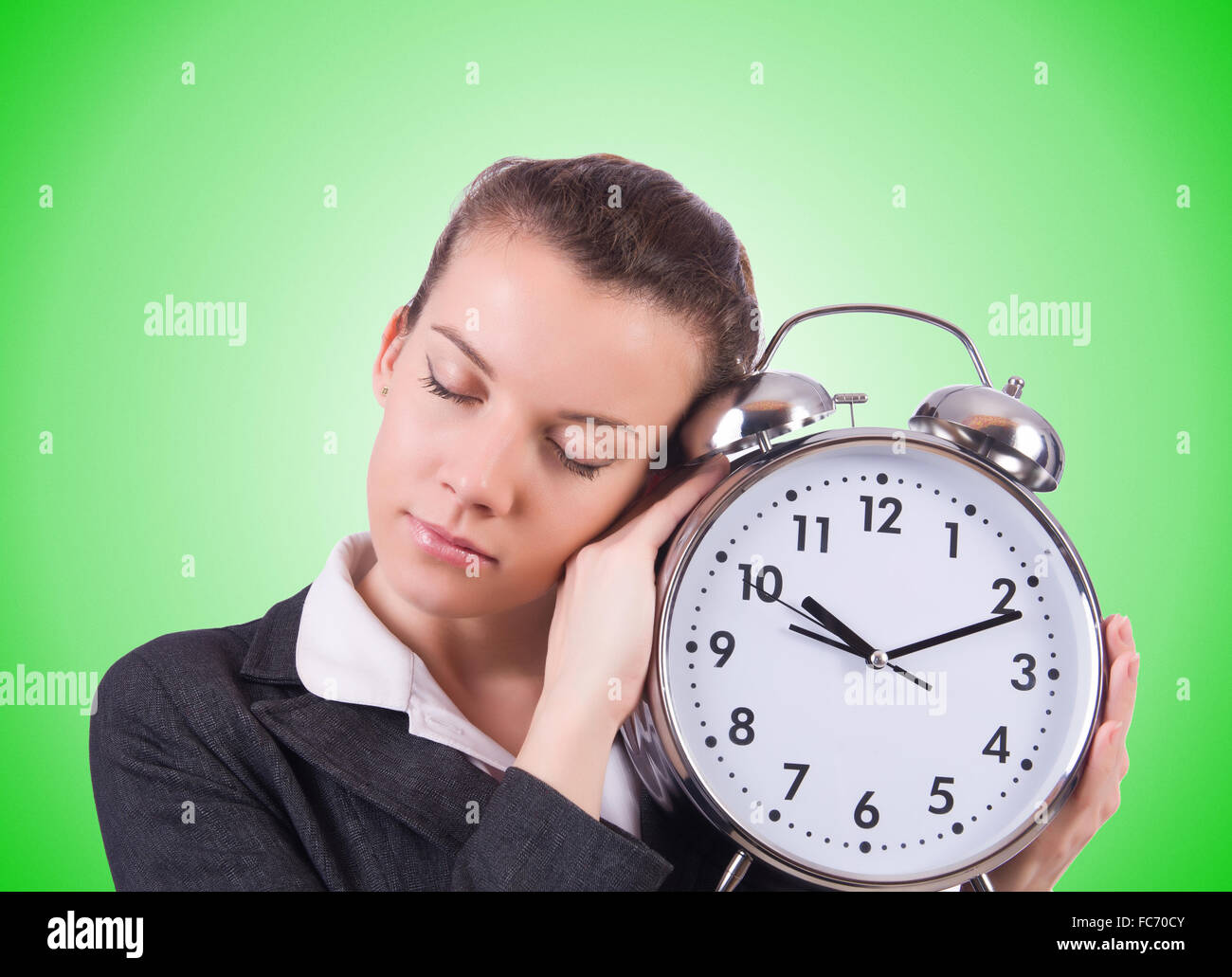 Woman with giant clock on white Stock Photo - Alamy