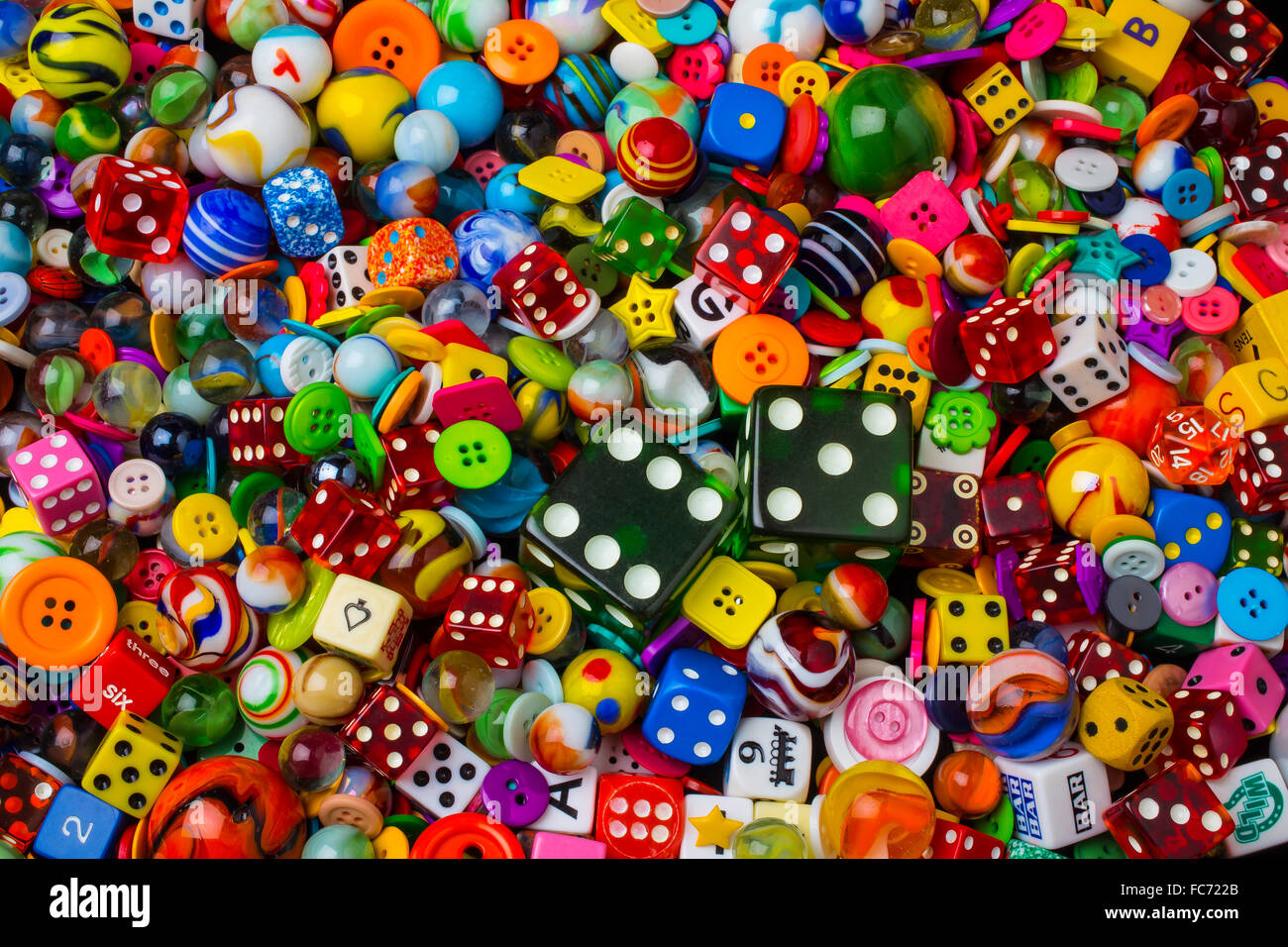 Dice Marbles With Buttons Stock Photo