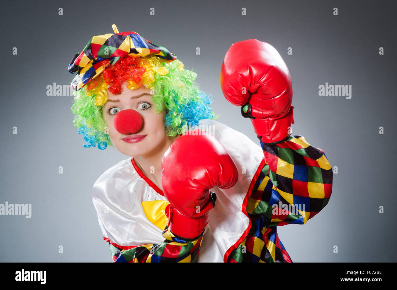 Funny clown with boxing gloves Stock Photo Alamy