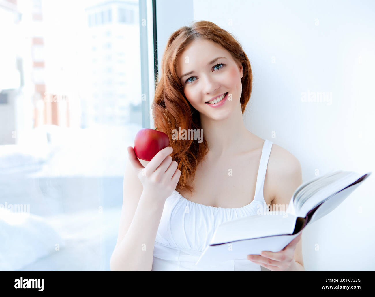 portrait of a young pretty woman at home Stock Photo - Alamy