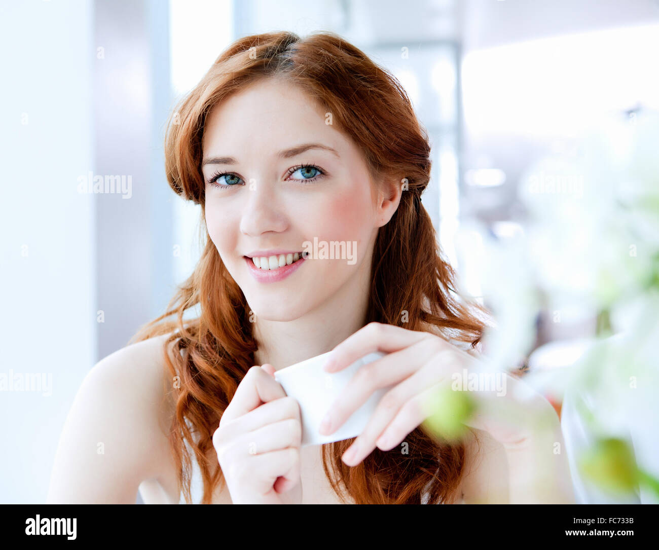 portrait of a young pretty woman at home Stock Photo - Alamy