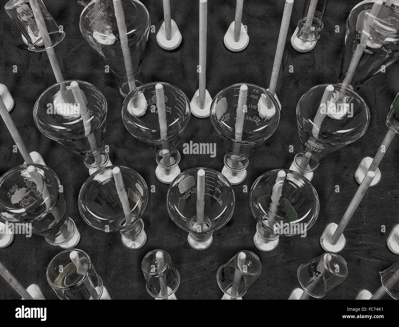High angle view of beakers on pillars - Smartphone Captured Stock Image