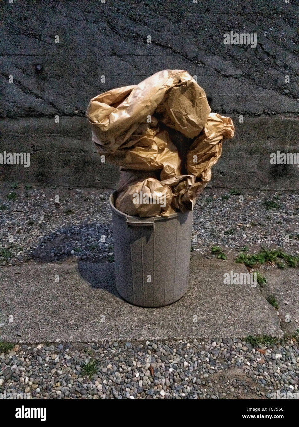 Garbage crumpled up in trash can - Smartphone Captured Stock Image