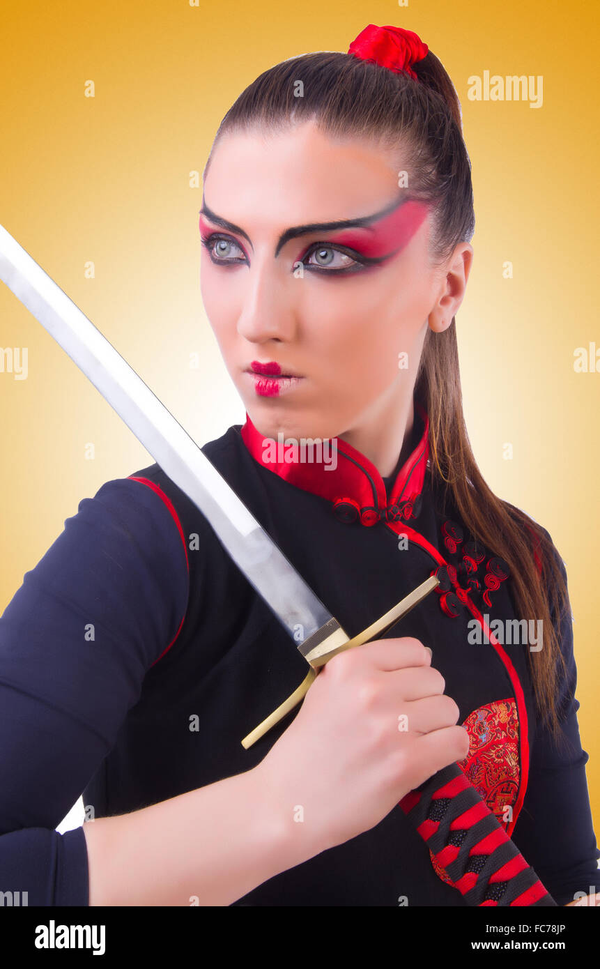 Woman in japanese martial art concept Stock Photo Alamy