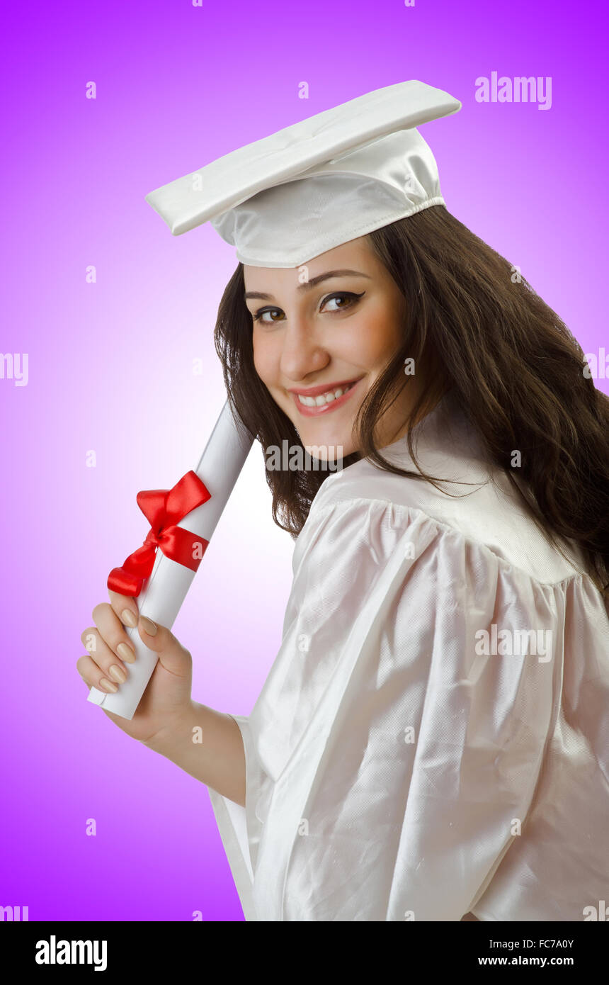 Happy student celebrating graduation on white Stock Photo - Alamy