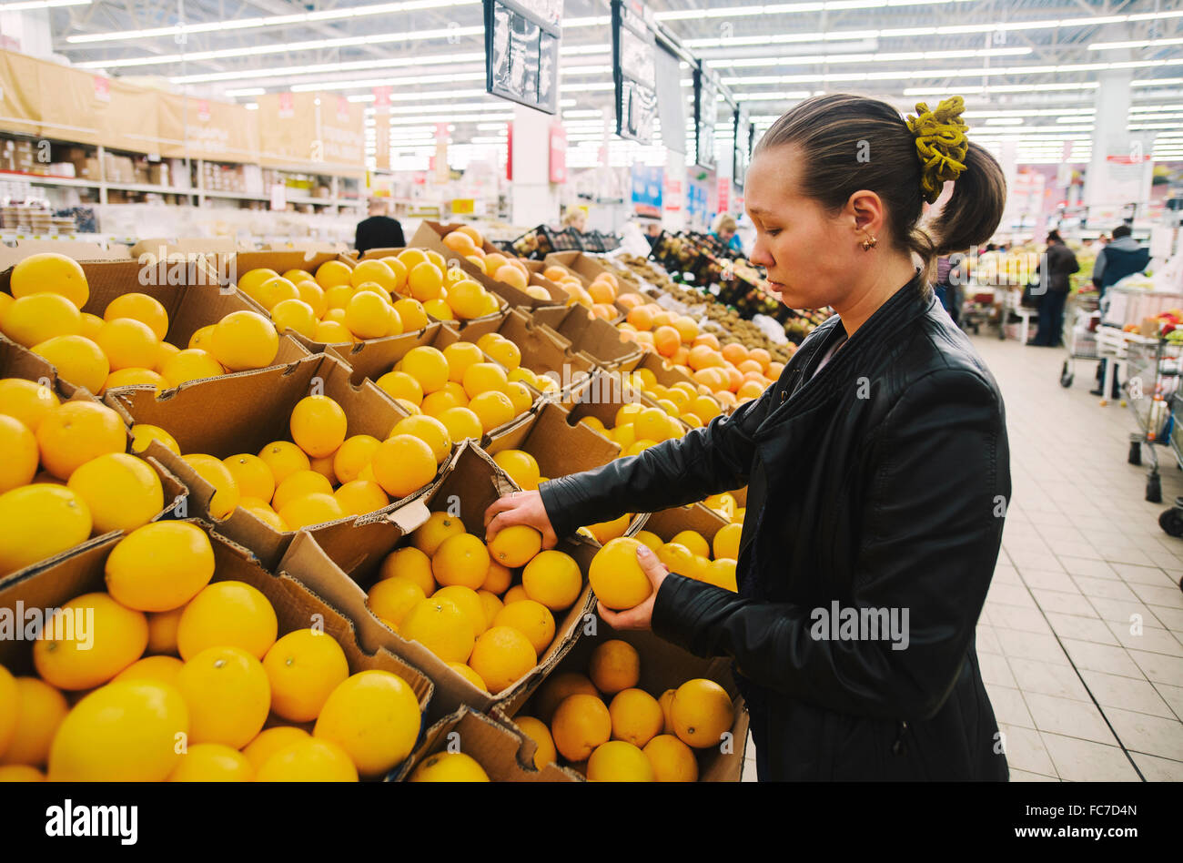 Caucasian woman shopping in grocery store Stock Photo
